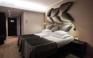 Отель Aqva Hotel & Spa Раквере Стандартный двухместный номер XL с 1 кроватью или 2 отдельными кроватями, право посещения спа-центра-1